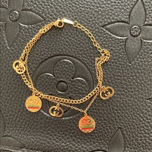 Gold-Tone Charm Bracelet with Red & Green Enamel Accents